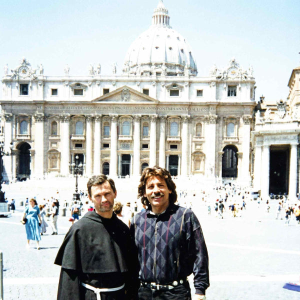 Shawn Rae with a friar in front of St. Peter's Basilica in Vatican City